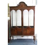 An early 20th century mahogany display cabinet,