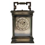 E Maurice & Co; a late 19th century French carriage clock, with push repeat and striking on a gong,