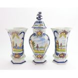 A Dutch Delft polychrome garniture, late 19th/20th century,