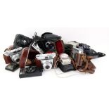 A Kodak Retina II camera, and two Kodak Retinette IA cameras in leather carrying cases,