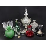 A group of glassware, late 19th/20th century, including: a ruby stained carafe,