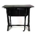 A Victorian aestethic period ebonised Sutherland table, on dual ring turned end standards,