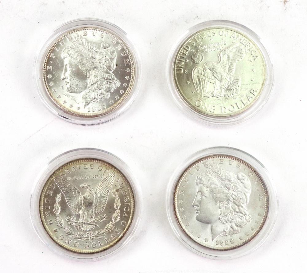 U.S.A. 1884, 1887 and 1889 silver one dollars and a 1971 one dollar (4).