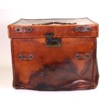 A vintage brown leather travelling case, late 19th/early 20th century, with brass fittings,