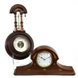 A French Art Nouveau mahogany walnut inlaid and mother of pearl mantel timepiece, of shaped outline,