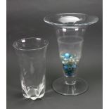 An Orrefors glass vase, bell shaped with lobed base,