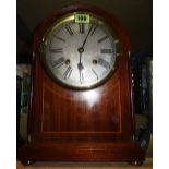 An Edwardian English cased eight day mantel clock, with a German movement.