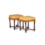 A pair of William & Mary walnut framed square footstools,