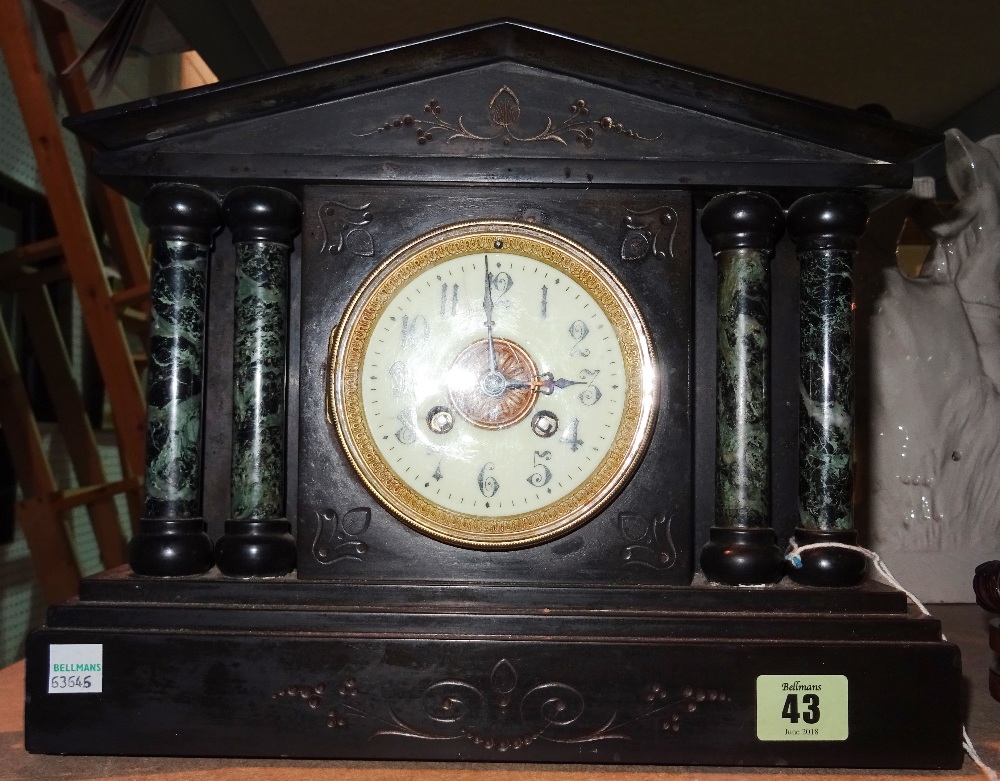 A 19th century black slate and marble eight day mantel clock, 31cm wide x 26cm high.