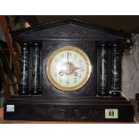 A 19th century black slate and marble eight day mantel clock, 31cm wide x 26cm high.