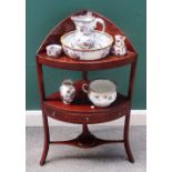 A Regency mahogany bowfront corner wash stand,