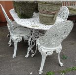 A 20th century white painted metal oval table with six chairs, 162cm wide, (7).