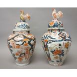 Two Japanese Imari vases and covers, Edo period, circa 1700, each of ovoid form,