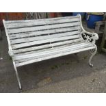 A 20th century white painted metal and wooden garden bench, 130cm wide.