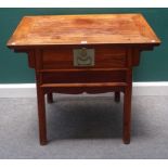 An early 20th century Chinese side table, possibly Huanghuali, with single frieze drawer,