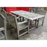 A 20th century rectangular teak garden table and four chairs, 178cm wide, (5).