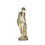 A reconstituted marble figure of a scantily clad Venus in a standing pose, 166cm high.