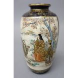 A Japanese Satsuma slender ovoid vase painted with figurative panels, Meiji period, signed, 16cm.