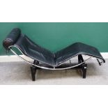 After Le Courbusier; a LC4 chaise longue with black leather upholstery, 165cm wide x 54cm high.