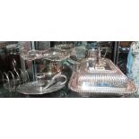 Silver plated wares, including; a fruit bowl of wavy form, jug, toast rack, chamber stick,