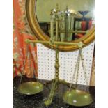 A set of early 20th century Doyle & Co London, brass balance scales.