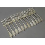 Silver table flatware, comprising; eight fiddle pattern table forks,