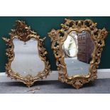 A 19th century Rococo revival gilt framed mirror, of shaped outline, 55cm wide x 86cm high,