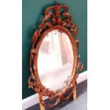 A mid-18th century gilt framed oval mirror,