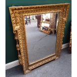 A George II style gilt framed stepped rectangular mirror,