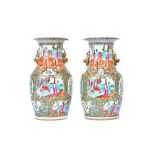 A pair of Canton famille-rose baluster vases, 19th century,