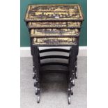 A nest of four early 19th century black lacquer chinoiserie decorated occasional tables,