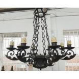 A pair of English wrought iron eight light chandeliers, late 20th century,