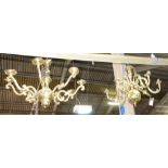 A 20th century gilt brass eight branch chandelier and a similar five branch chandelier, (2).