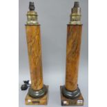 A pair of tole peinte lamps, converted, late 19th century, probably French, each of column form,