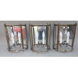 A set of three Georgian style wall lights, late 20th century, each of demi-lune form,