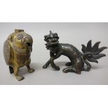 A Chinese gilt-bronze water dropper, Ming Dynasty, cast as a mythical bird standing with beak open,
