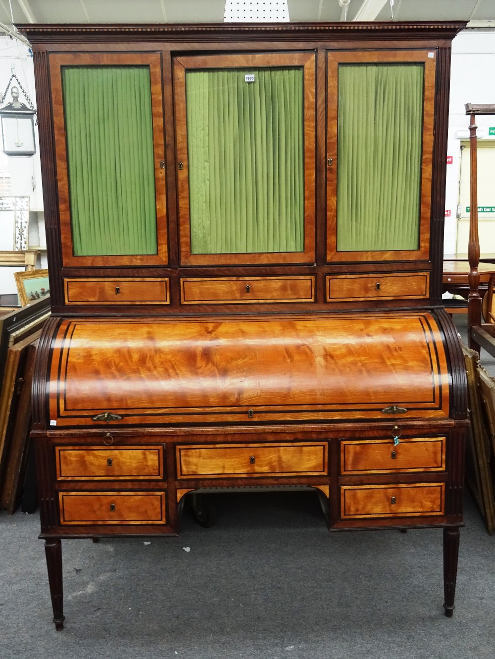A Louis XVI ormolu mounted satinwood, mahogany and ebonised cylinder bureau cabinet,