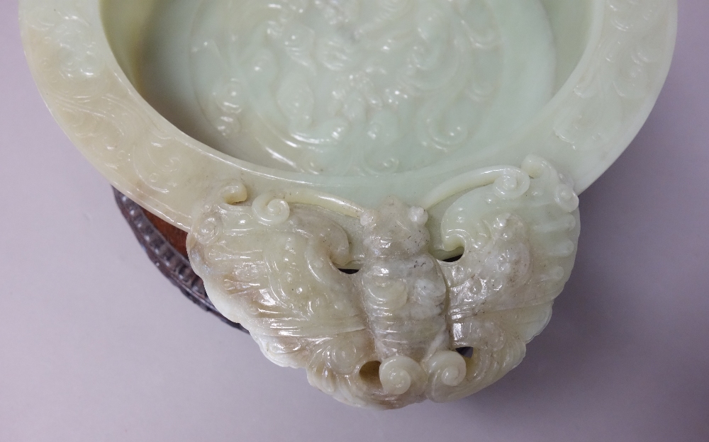 A Chinese green hardstone marriage bowl, 20th century, set with butterfly and ring handles, - Image 3 of 3