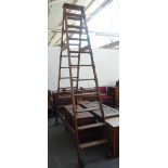 A set of late 19th/early 20th century pitch pine 'A' frame double sided ten rung library steps,