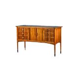 Attributed to Gordon Russell, a mid-20th century walnut concave fronted sideboard,