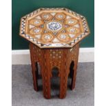 A late 19th century Eastern bone inlaid octagonal occasional table, with folding base,