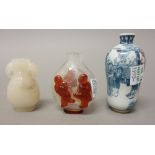 Three Chinese snuff bottles, 20th century, comprising; a jade bottle,