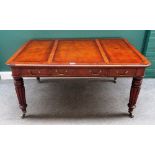 An early 19th century style mahogany centre writing table,