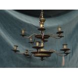A Victorian style brass twelve branch chandelier,