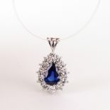 A pear-shaped sapphire and diamond drop-