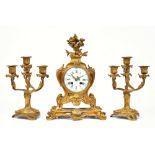 A Louis XV style gilt metal cased mantel