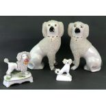 A pair of Staffordshire pottery Poodles,