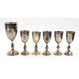 A set of six silver kiddush cups, Simon