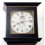 An early 19th century longcase clock, the case later ebonised and gilded,