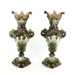 A pair of Julius Dressler vases marked 'J B D', and impressed Austria 476 to the base, 25.5cm high.